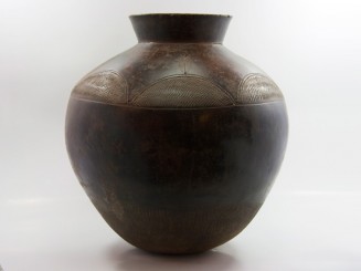 Old engraved terracotta pot